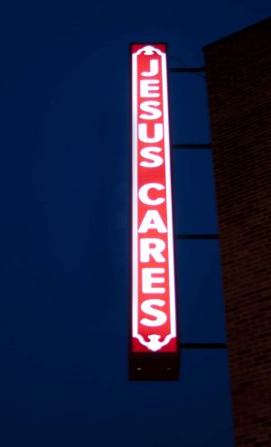 Jesus Cares sign - History